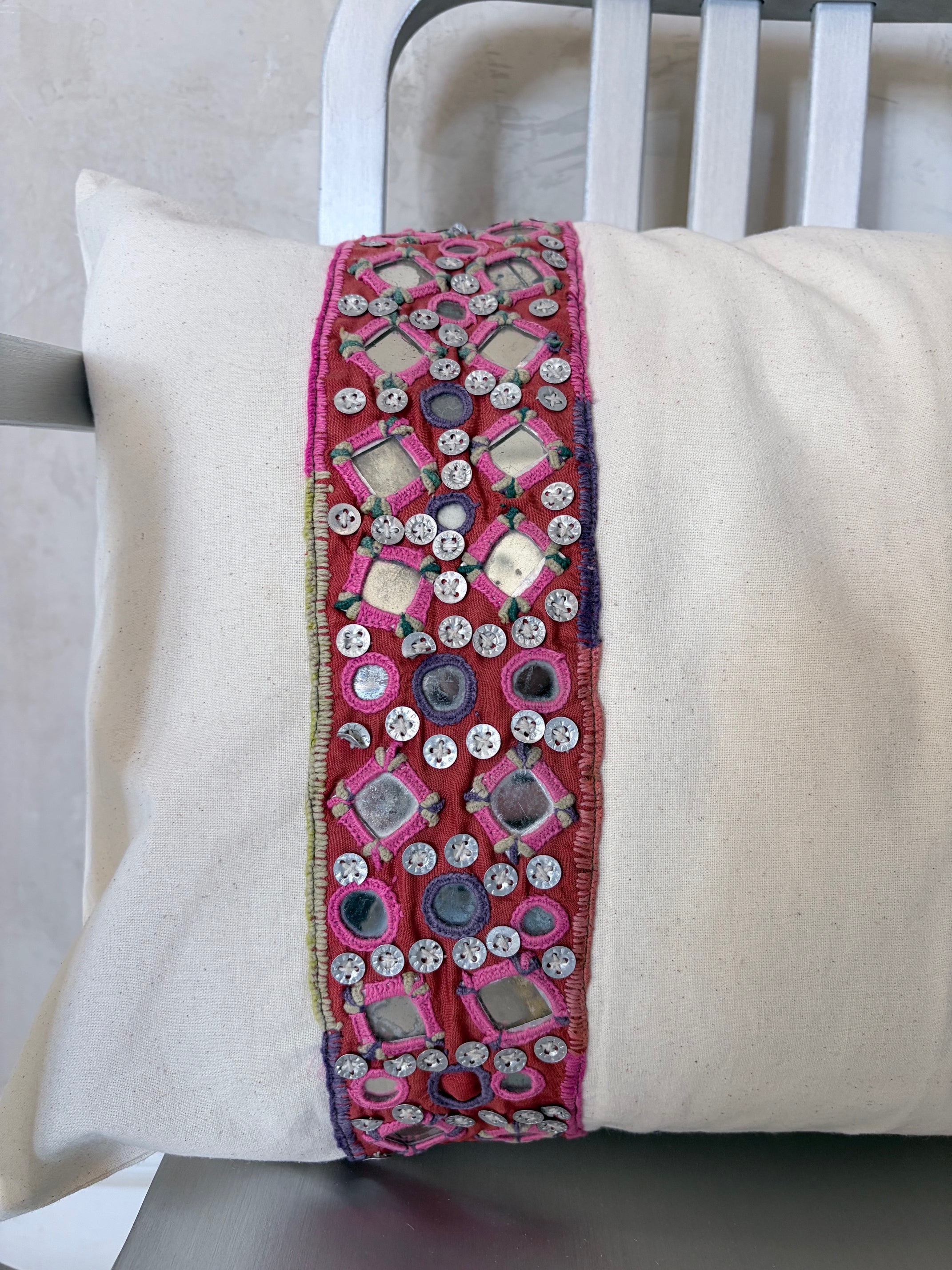 close up of pillow on chair
