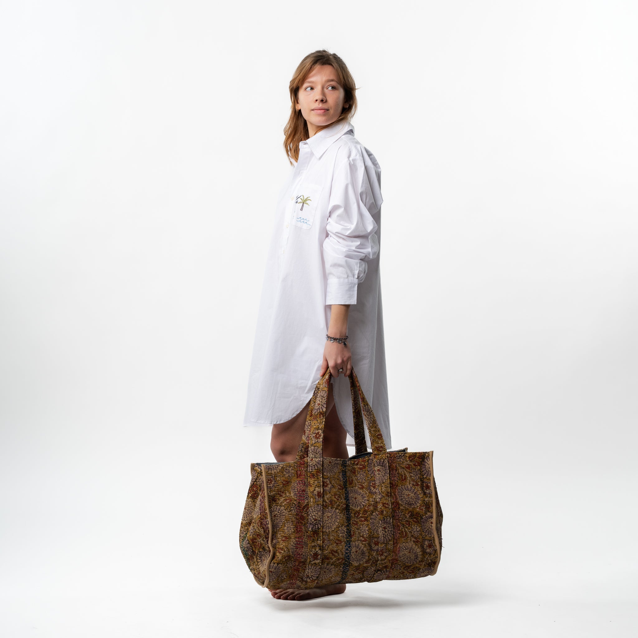 white shirt lavender bag