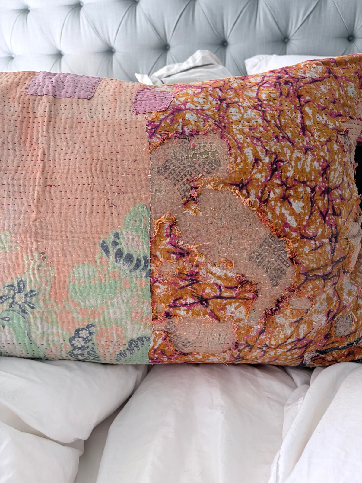 close up of pillow on bed