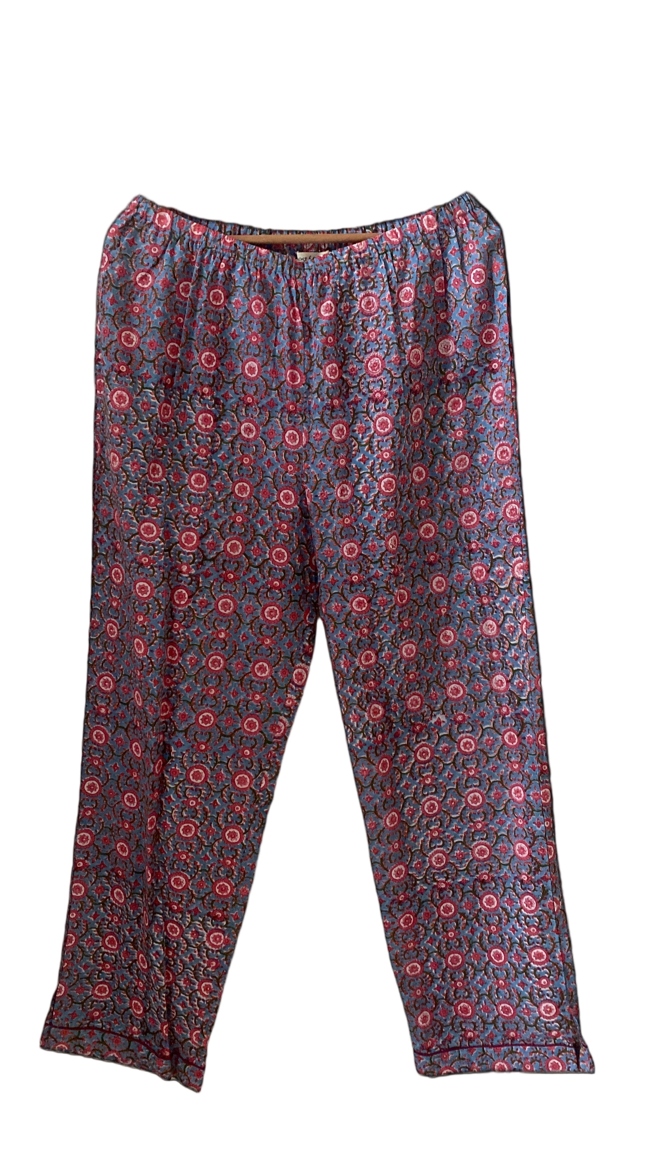 Floral patterned pants on a white background