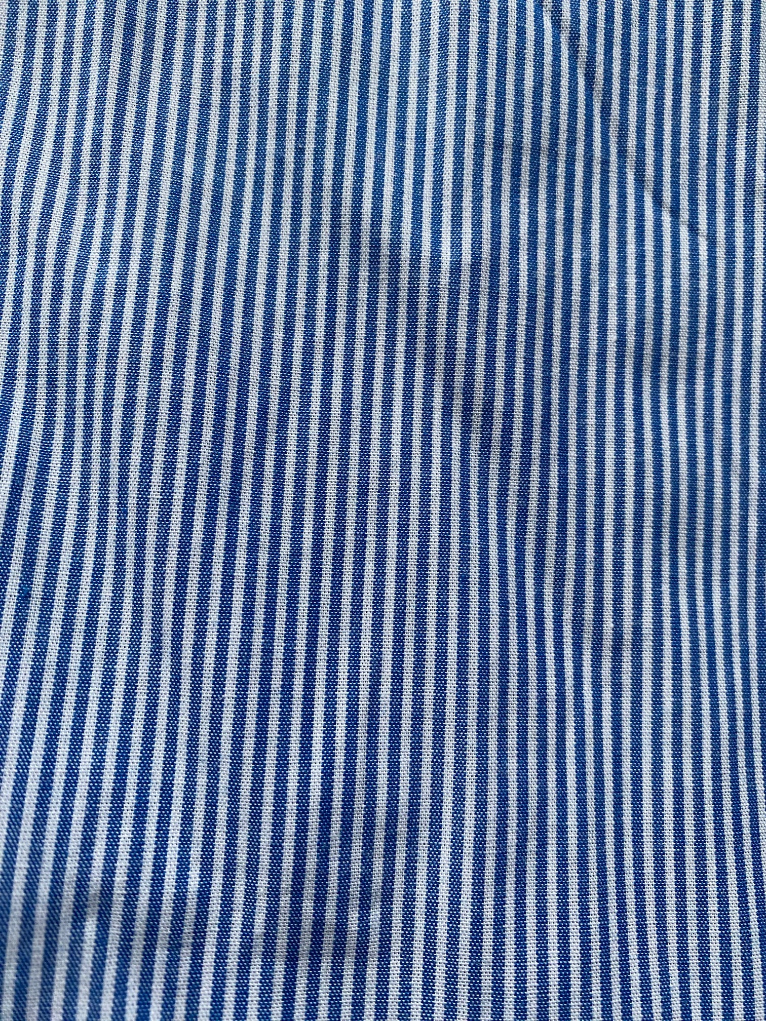 Close-up of blue and white striped fabric texture