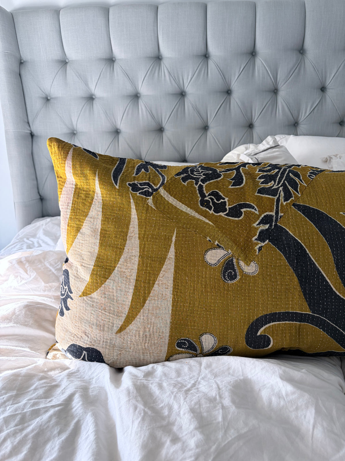 close up of pillow on bed